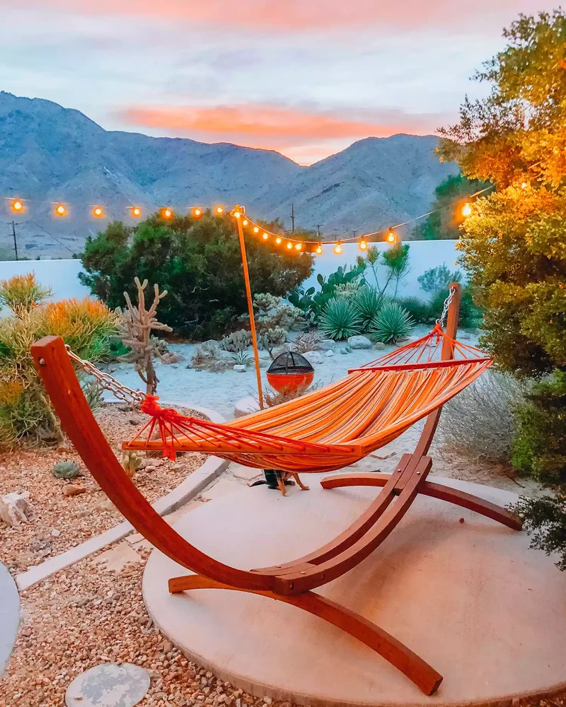 20 Budget-Friendly No-Grass Backyard Ideas You'll Love 2 A Spot to Nap