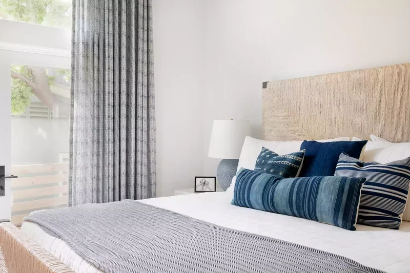 25 Navy Blue Bedroom Designs That Transcend Nautical Style 9 Add Navy Throw Pillows