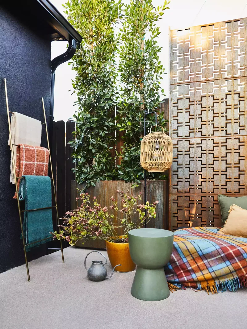 65 Outdoor Patio Decor Ideas to Elevate Your Backyard 47 Add a Blanket Ladder