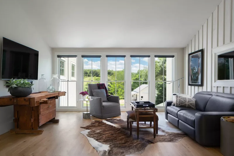 40 Cozy and Inviting Country Living Room Design Ideas 16 Add a Cowhide Rug