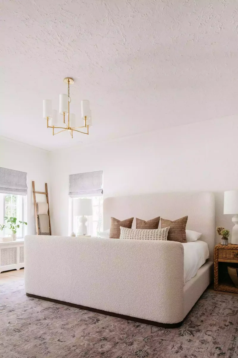 37 Guest Bedroom Ideas to Make Visitors Feel at Home 16 Add a Cozy Oversized Bed