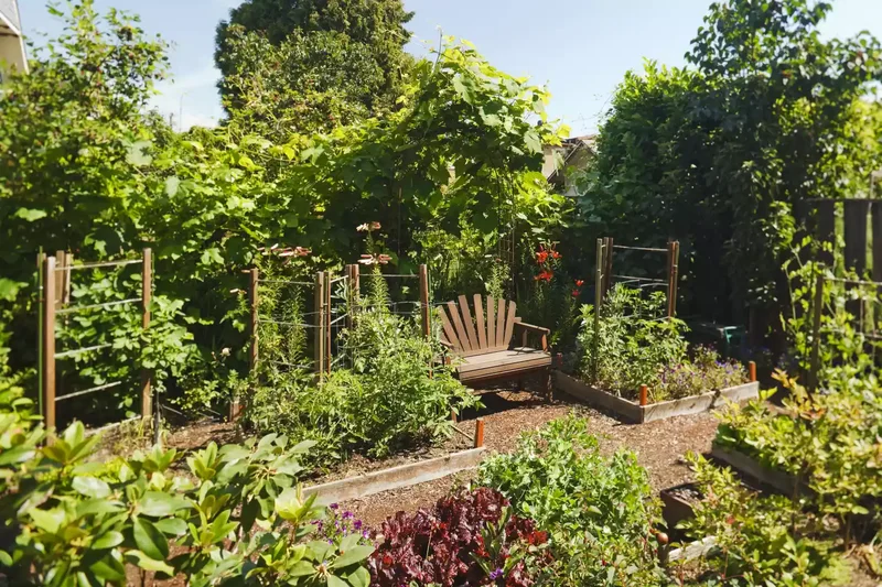 26 Vegetable Garden Ideas for Fresh Homegrown Produce 23 Add a Cozy Seating Nook