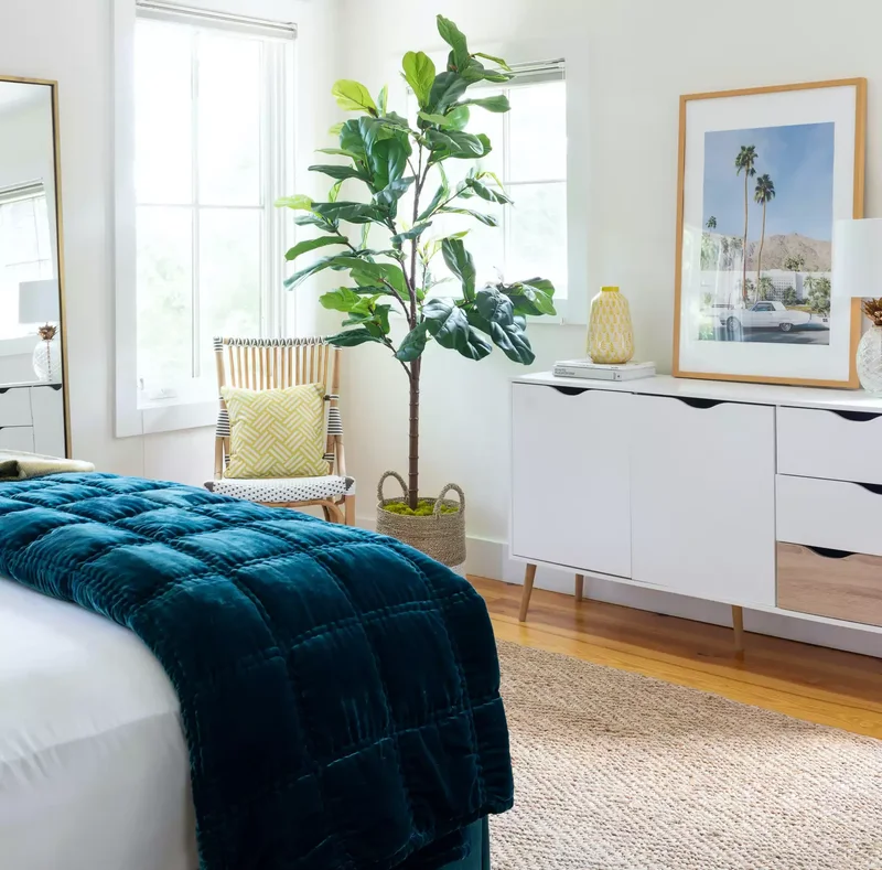 25 Navy Blue Bedroom Designs That Transcend Nautical Style 1 Add a Luxurious Navy Blue Throw Blanket