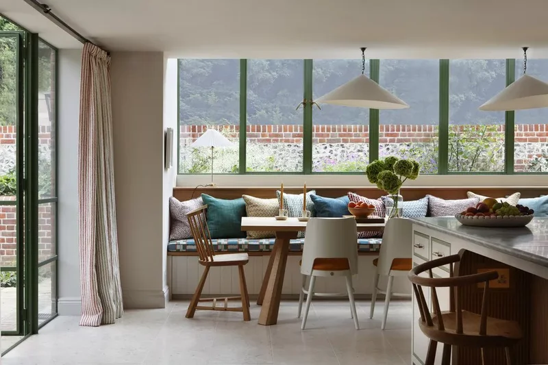 37 Banquette Seating Designs That Bring Cafe Vibes Home 6 Add a Patterned Seat Cushion