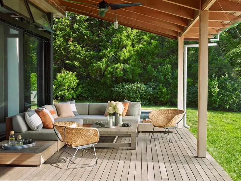 15 Ground-Level Deck Designs for Your Dream Outdoor Retreat 11 Add a Side Porch