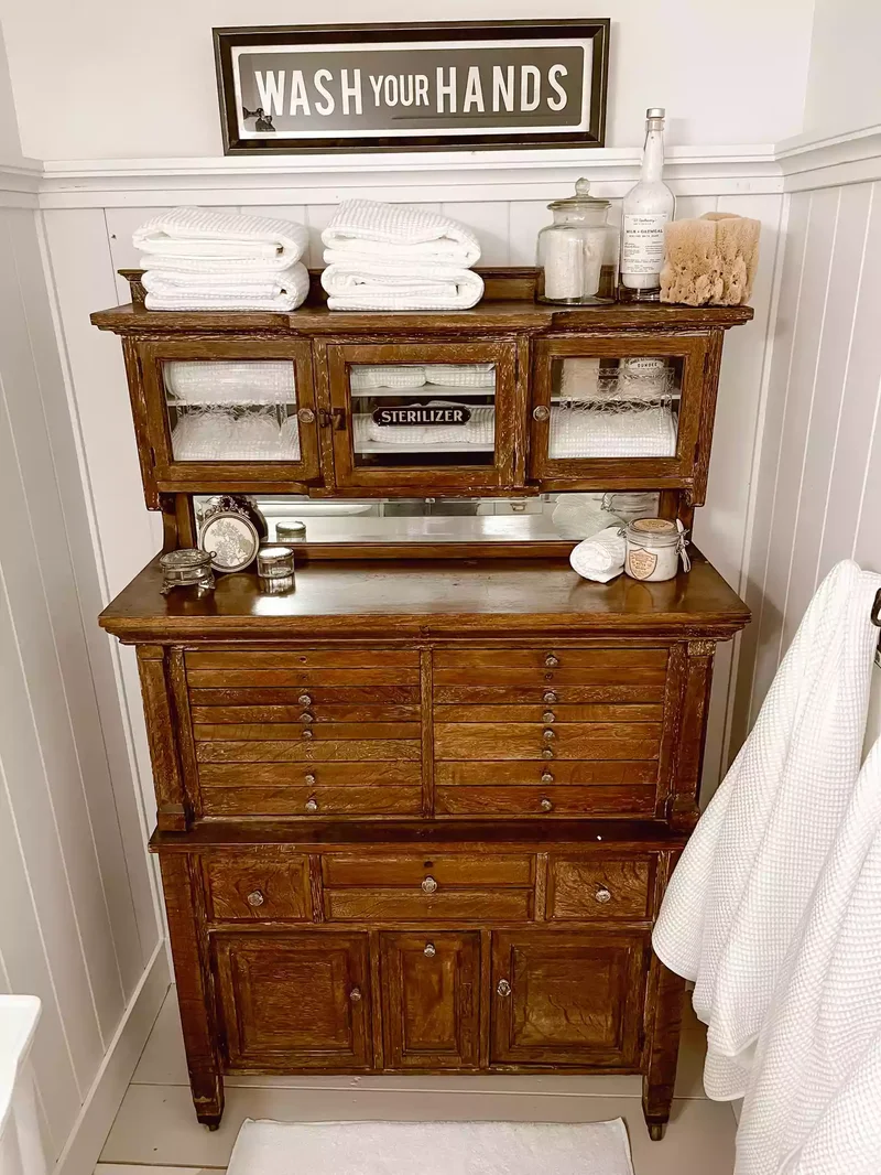 32 Modern Farmhouse Bathroom Designs That Never Go Out of Style 30 Add a Vintage Cabinet