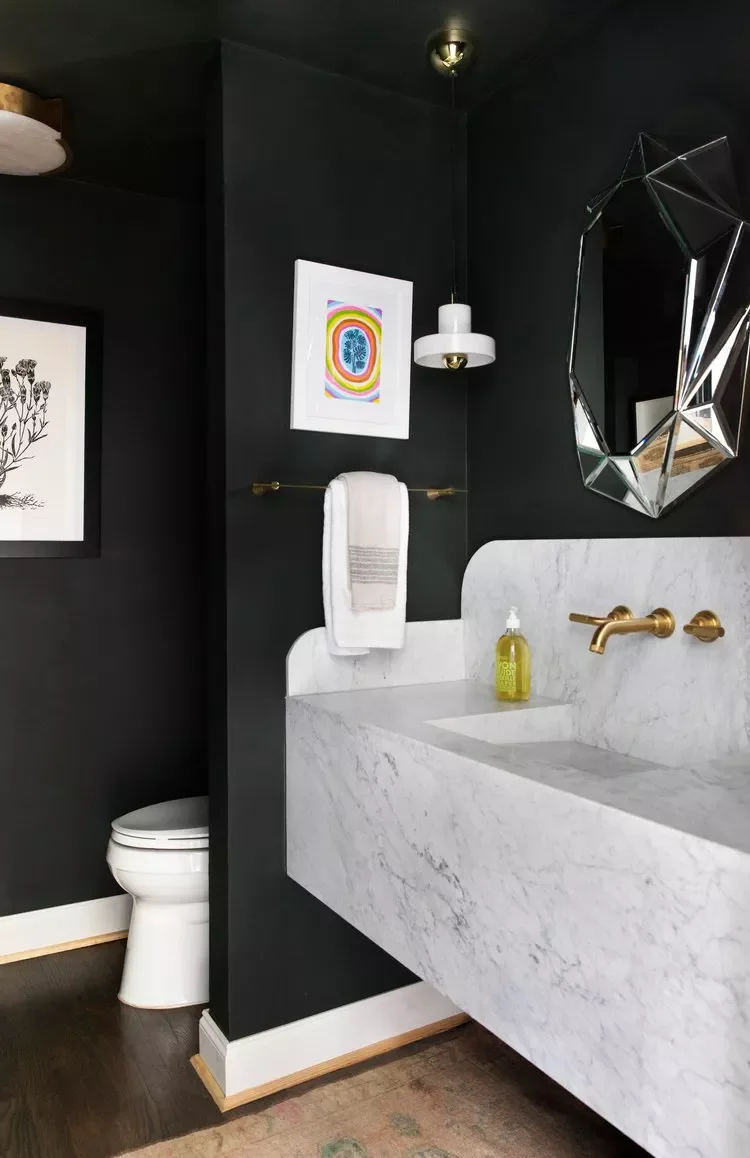 50 Moody Dark Bathroom Ideas for a Dramatic Transformation 12 Add an Off-White Countertop for Contrast