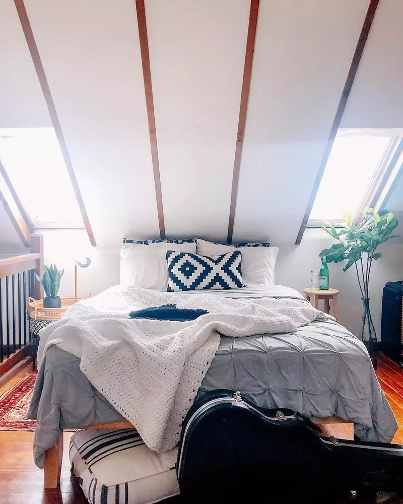 28 Sloped Ceiling Bedroom Ideas That Maximize Your Space 28 Against the Wall