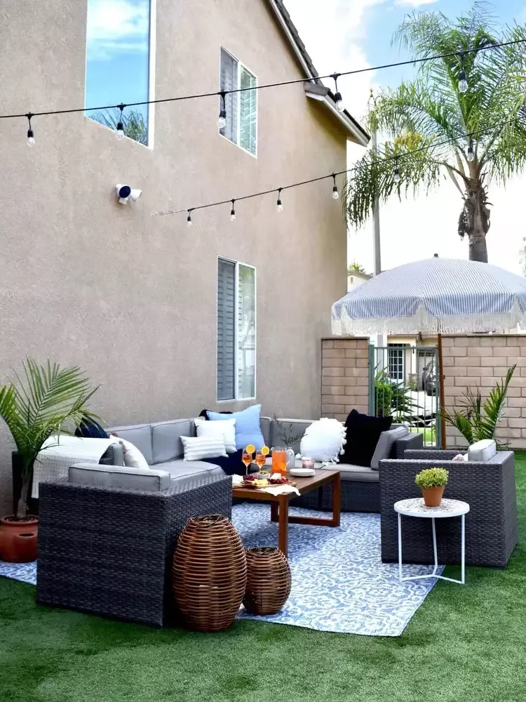 39 Contemporary Backyard Ideas to Elevate Your Outdoor Oasis 18 Anchor With an Outdoor Rug