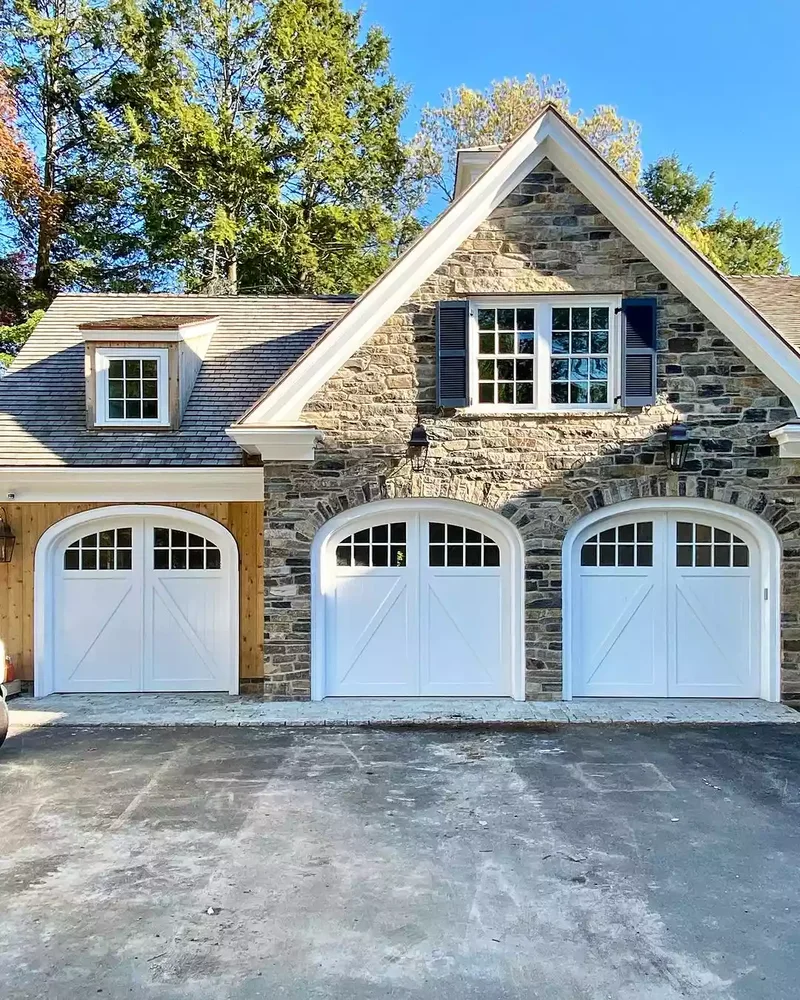 52 Stunning Garage Door Ideas to Boost Your Curb Appeal 13 Arched Doors With Decorative Trim