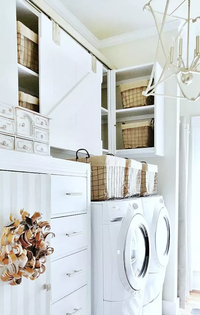24 Laundry Room Cabinet Ideas for an Organized Space 18 Barn Door Cabinet Closure