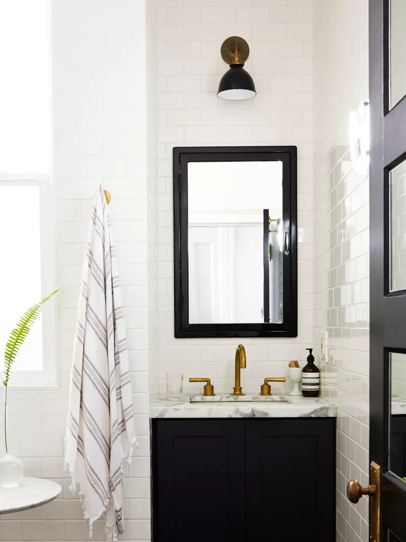 31 Stunning Black and White Bathroom Design Ideas 6 Brass Bathroom Accents