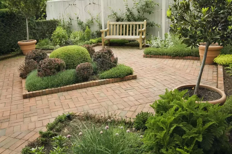 Brick Patio With Planting Beds