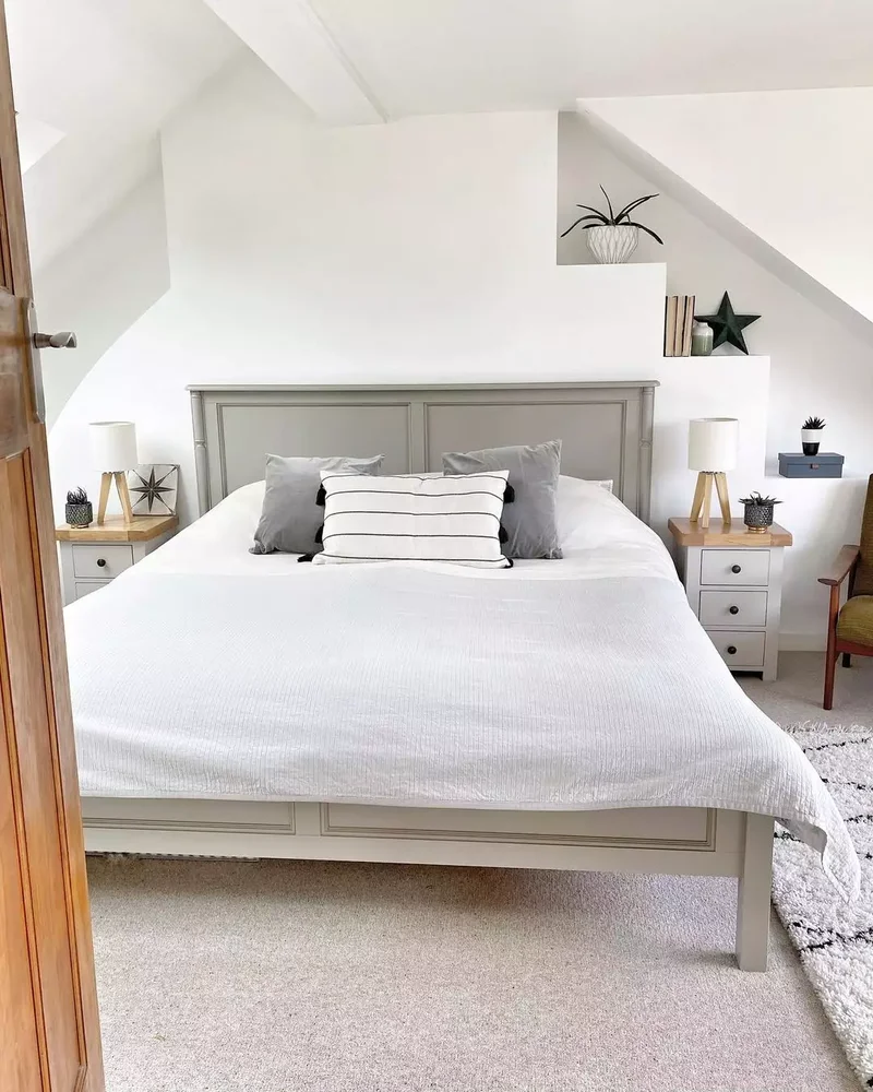 28 Sloped Ceiling Bedroom Ideas That Maximize Your Space 26 Built-In Shelves