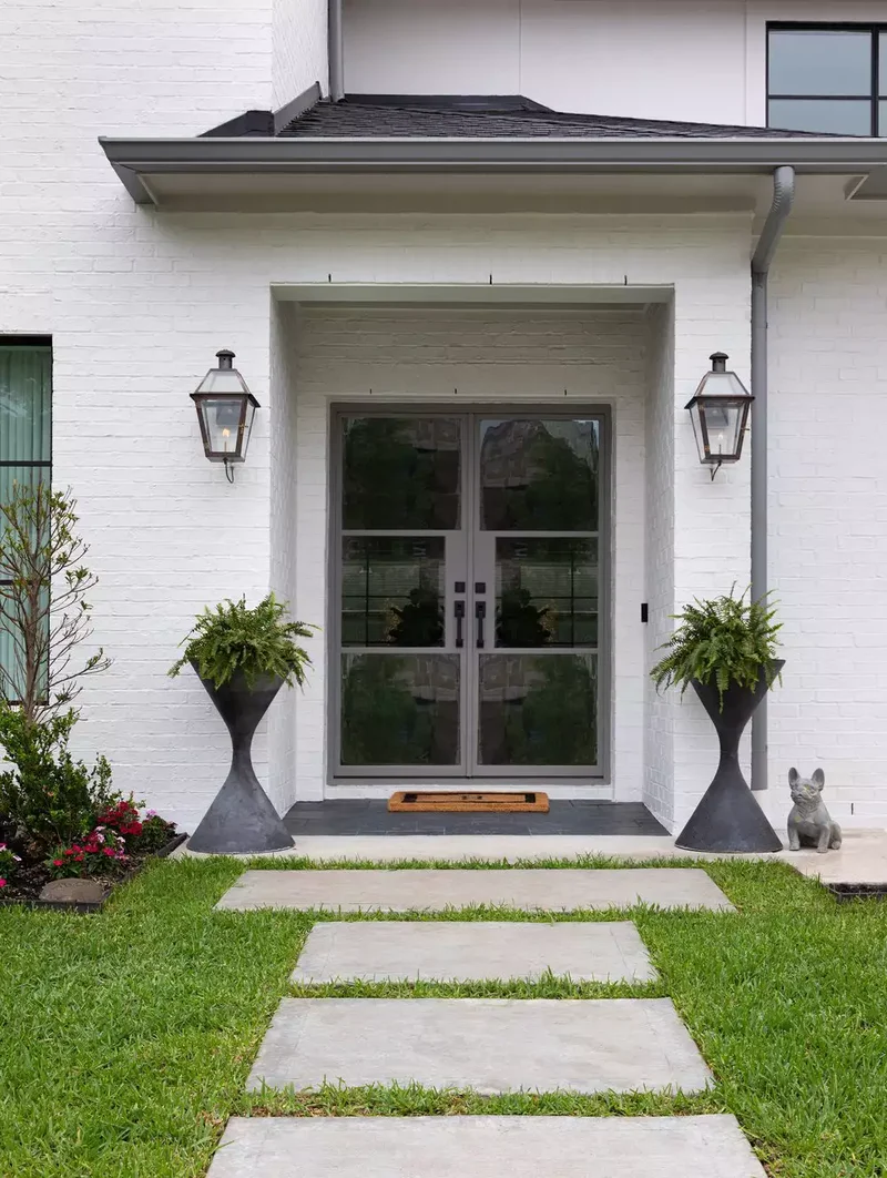 30 Front Walkway Ideas That Create a Stunning Entrance 5 Cement Slab + Grass Walkway