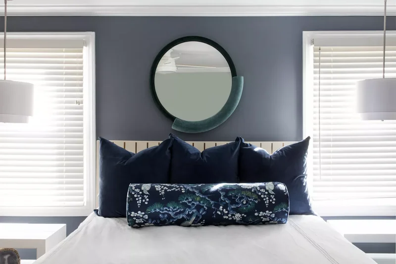 15 Beautiful Bedroom Mirror Ideas That Expand Your Space 2 Center a Mirror Over the Bed