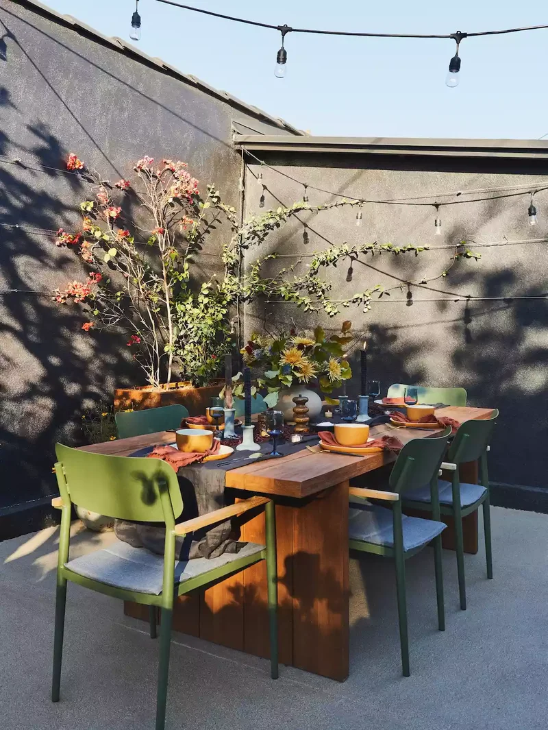 36 Concrete Patio Designs to Transform Your Backyard 8 Concrete Patio With Green Accents