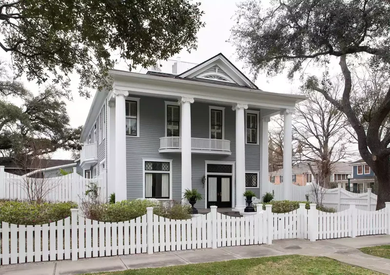 14 Affordable Picket Fence Ideas for Classic Curb Appeal 4 Consider a Stone Pathway