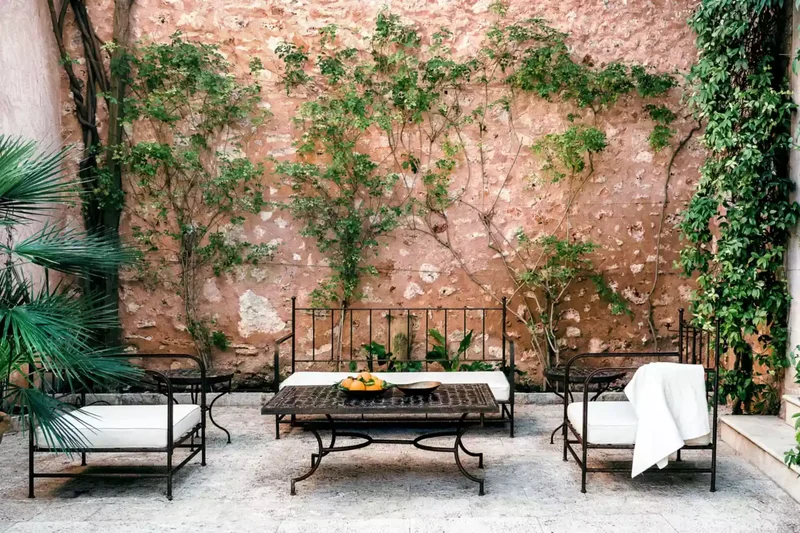 52 Beautiful Courtyard Ideas for Your Outdoor Living Space 51 Courtyard Feature Wall