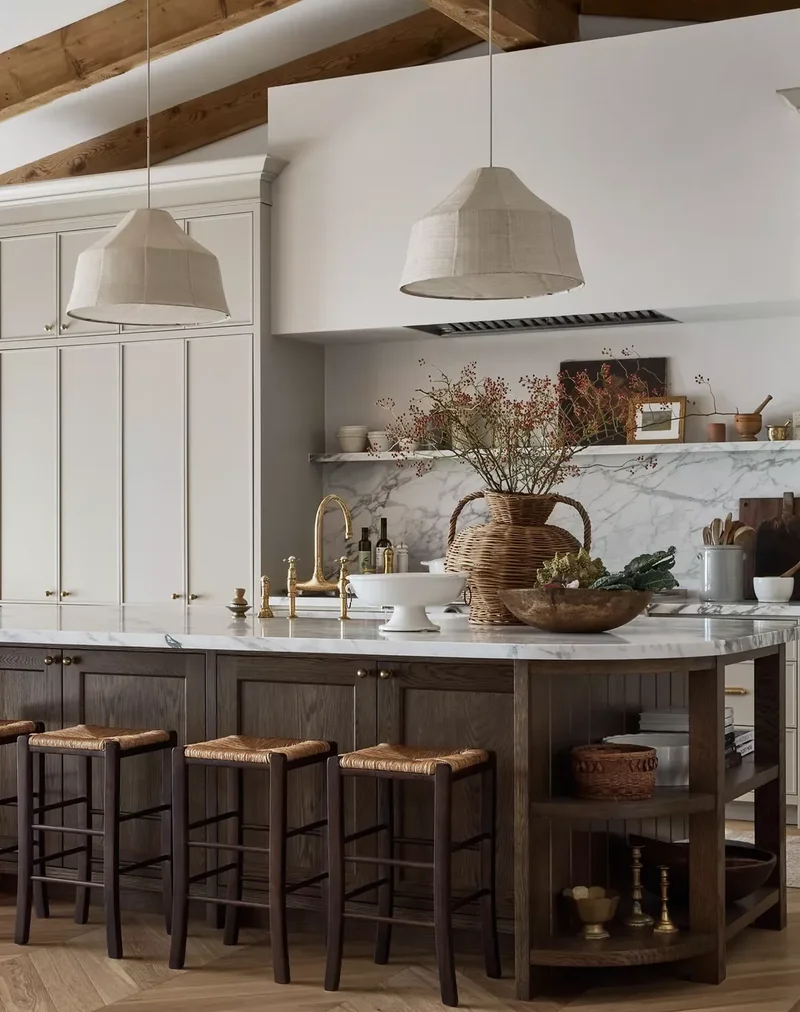 34 White & Wood Kitchen Designs That Feel Fresh and Timeless 7 Cream Cabinets With Dark Wood Island and Herringbone Floors