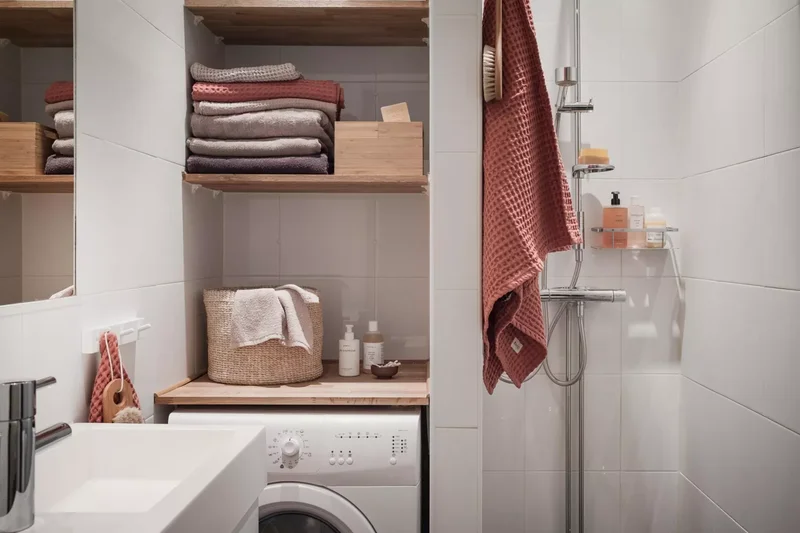 53 Stylish Small Laundry Room Ideas That Work Beautifully 33 Create a Bathroom Laundry Niche