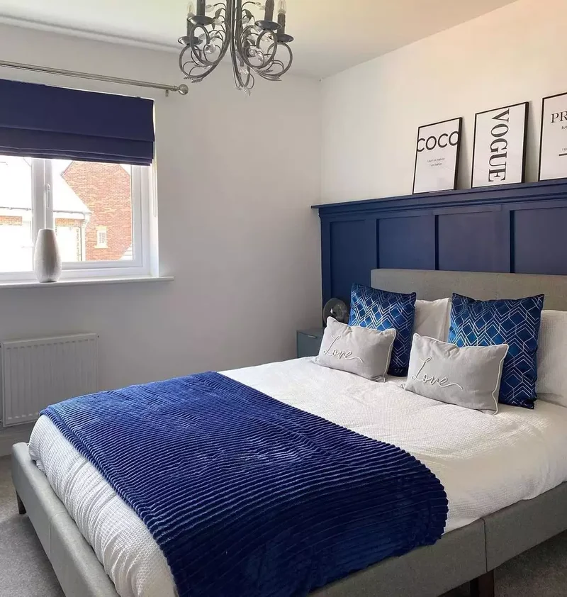 25 Navy Blue Bedroom Designs That Transcend Nautical Style 19 Create a Headboard Accent Wall