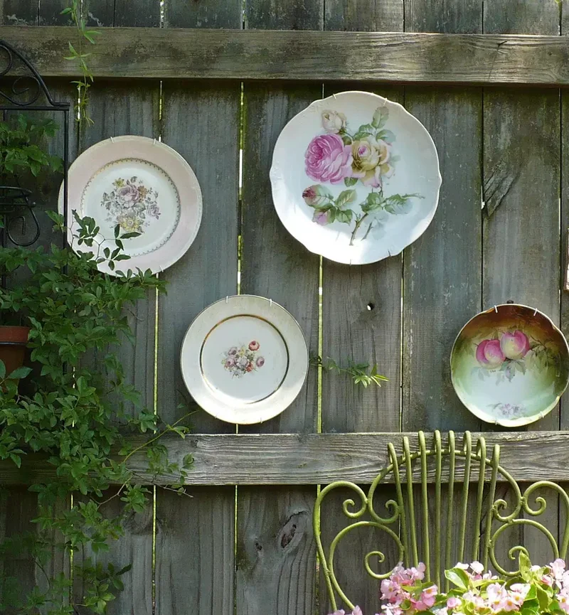 30 Creative Fence Decorating Ideas to Transform Your Yard 27 Create a Plate Wall