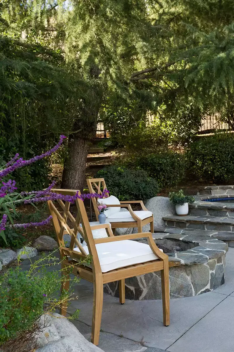15 Sloped Backyard Solutions to Maximize Your Outdoor Space 11 Create a Private Santuary