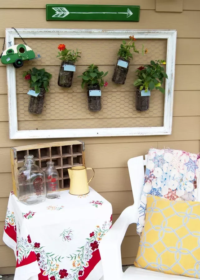 35 DIY Backyard Garden Projects to Transform Your Space 13 DIY Mason Jar Wall Garden