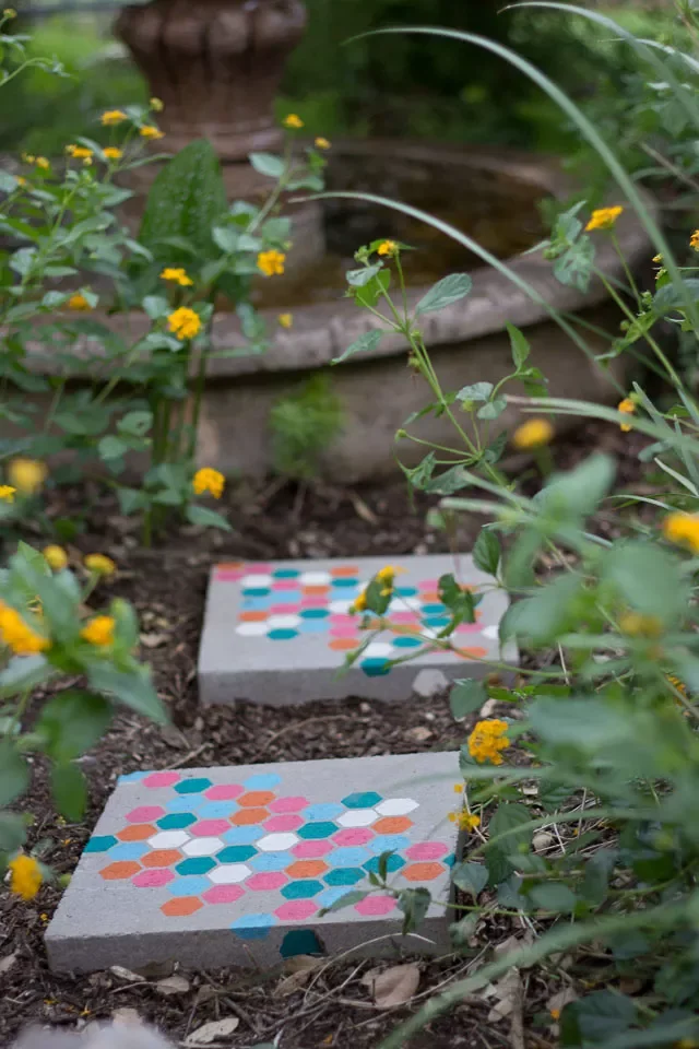 35 DIY Backyard Garden Projects to Transform Your Space 16 DIY Stenciled Garden Stepping Stones