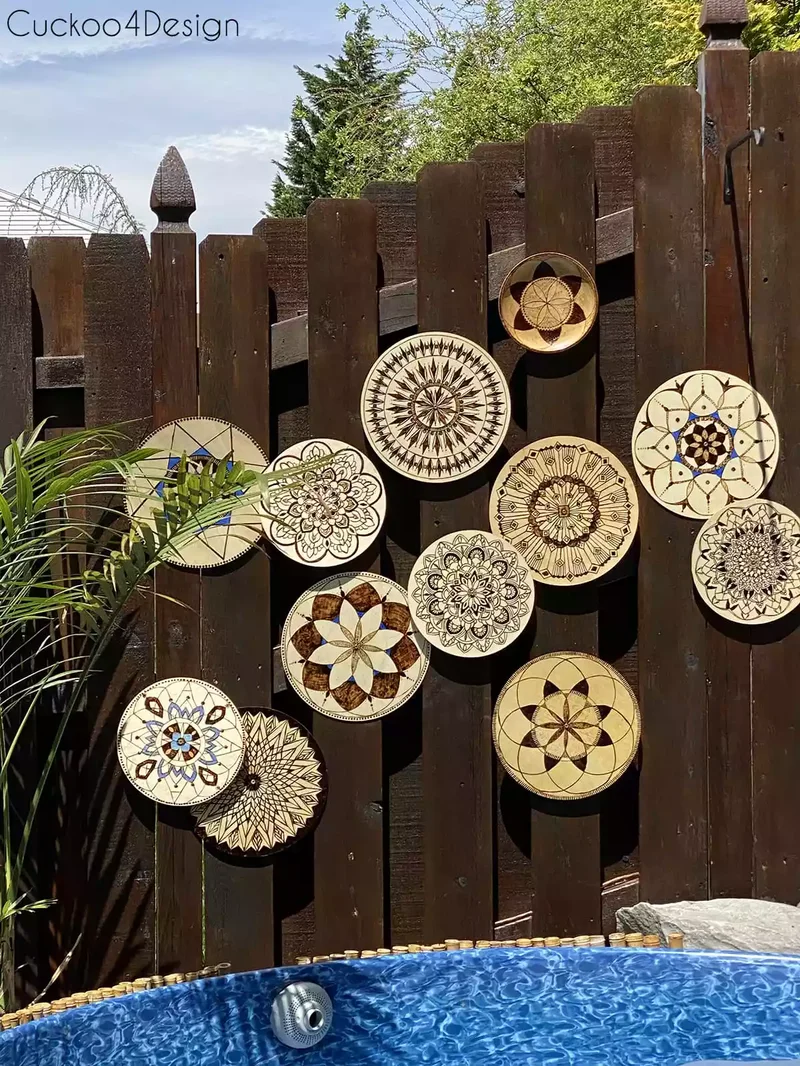 30 Creative Fence Decorating Ideas to Transform Your Yard 23 DIY Wooden Discs