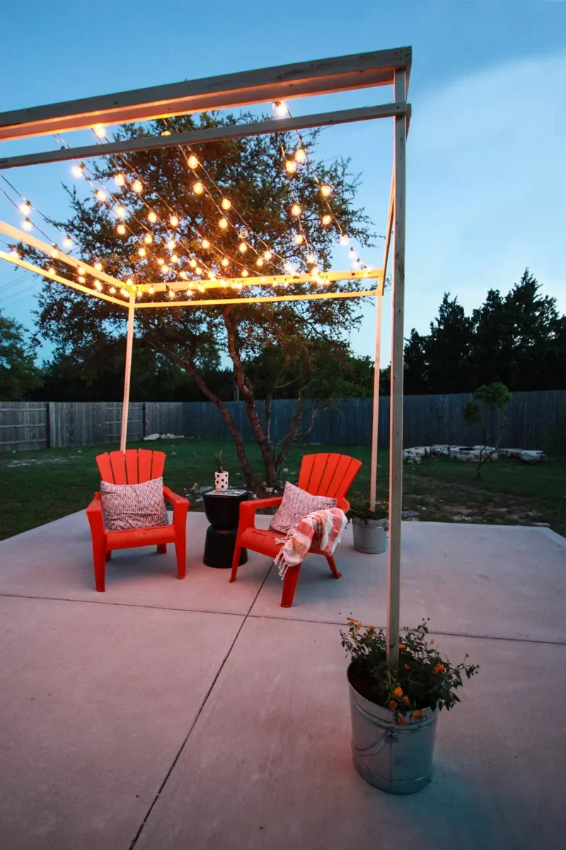 40 Budget-Friendly DIY Backyard Projects for Your Dream Oasis 14 DIY a Pergola With String Lights