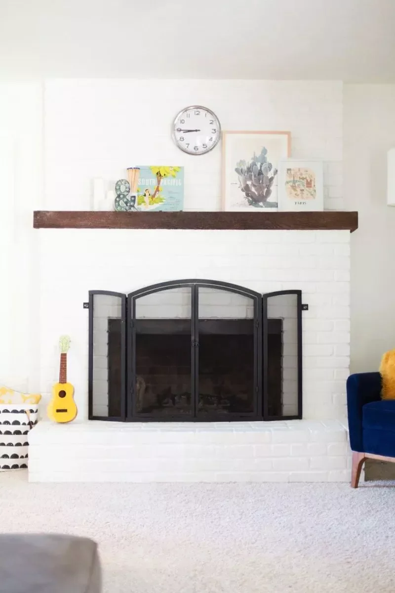 42 White Brick Fireplace Ideas to Modernize Your Living Space 27 Dark Stained Wood Mantel