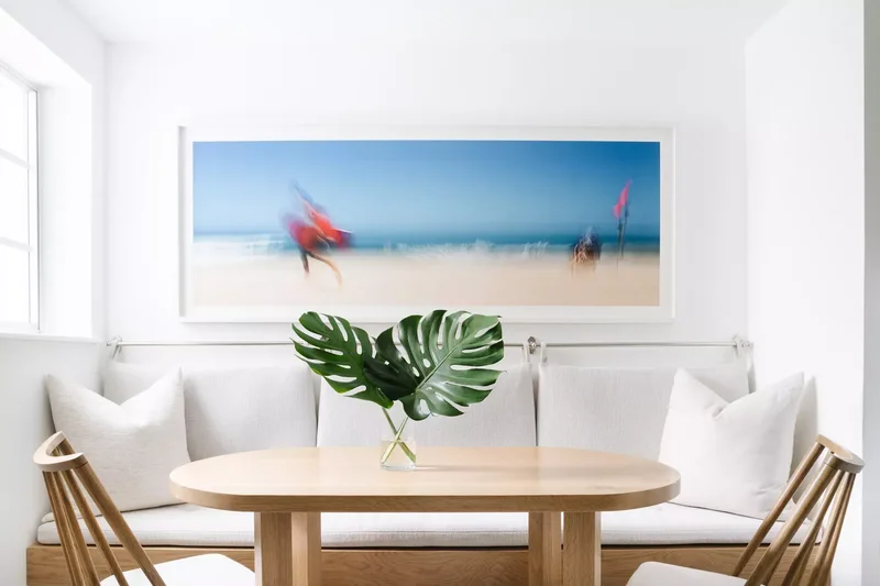 37 Banquette Seating Designs That Bring Cafe Vibes Home 14 Decorate the Wall Above