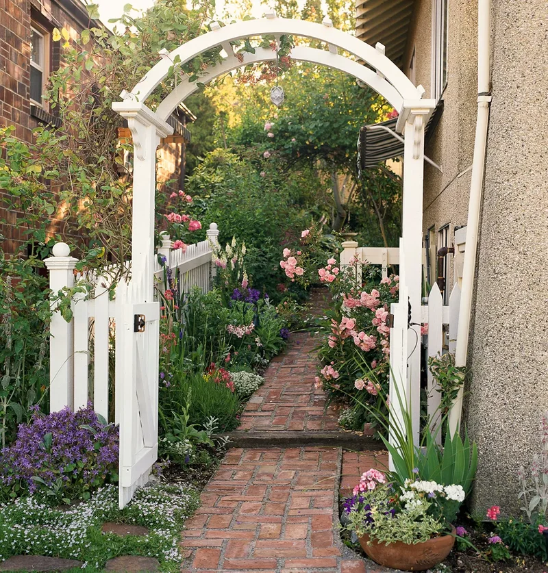 20 Beautiful Garden Arbor Ideas for Your Outdoor Oasis 9 Develop a Special Side Yard