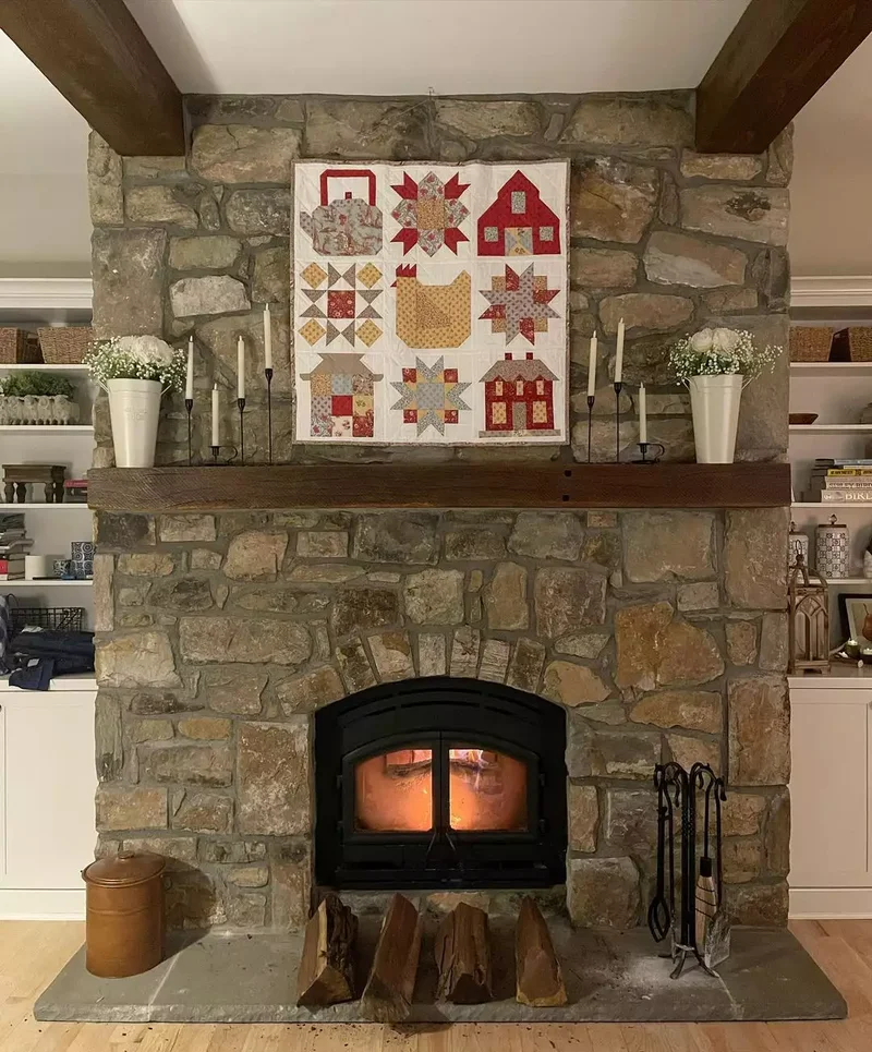 34 Cozy Farmhouse Fireplace Designs to Transform Your Room 4 Display a Patchwork Quilt