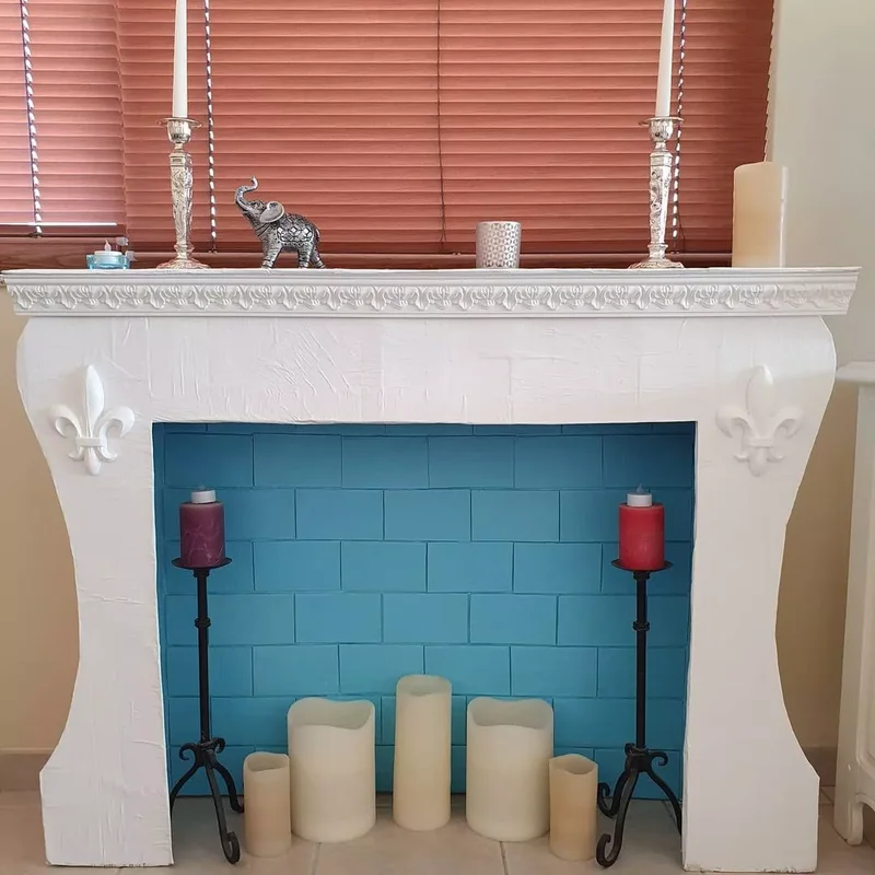 24 Creative Ways to Display Candles in Your Fireplace 3 Drop It Low
