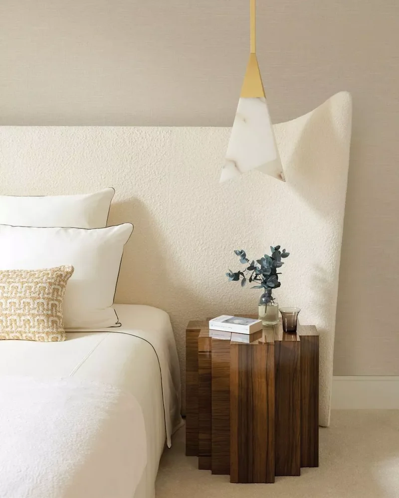 40 White Bedroom Designs That Show This Color Is Far from Dull 29 Embrace a White Boucle Headboard