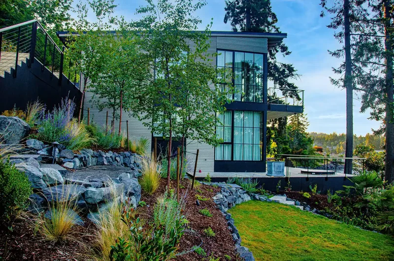 15 Sloped Backyard Solutions to Maximize Your Outdoor Space 12 Embrace the Slope