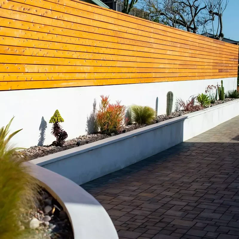 Fence Above Concrete Garden Bed