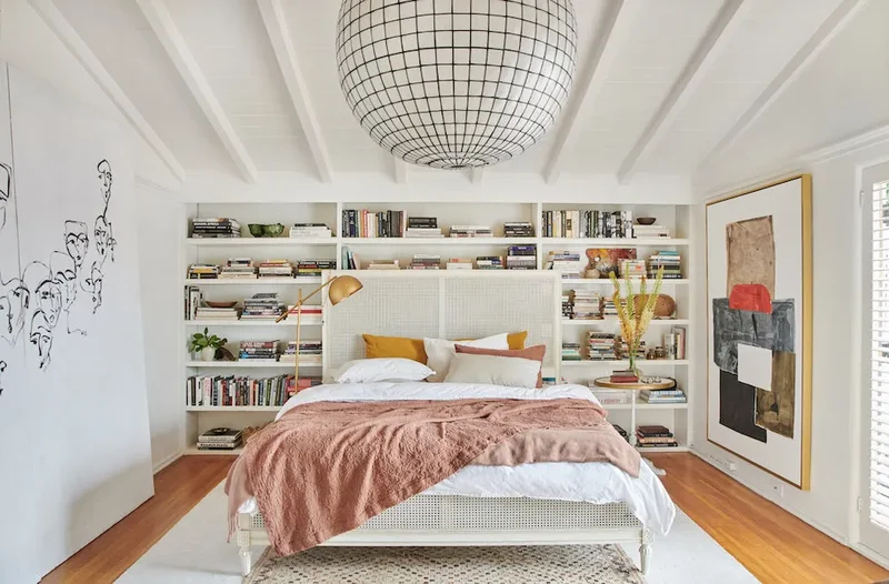 45 Warm and Inviting Bedroom Ideas for Ultimate Comfort 31 Fill It With Art and Books