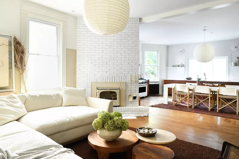 42 White Brick Fireplace Ideas to Modernize Your Living Space 39 Floor-to-Ceiling Brick