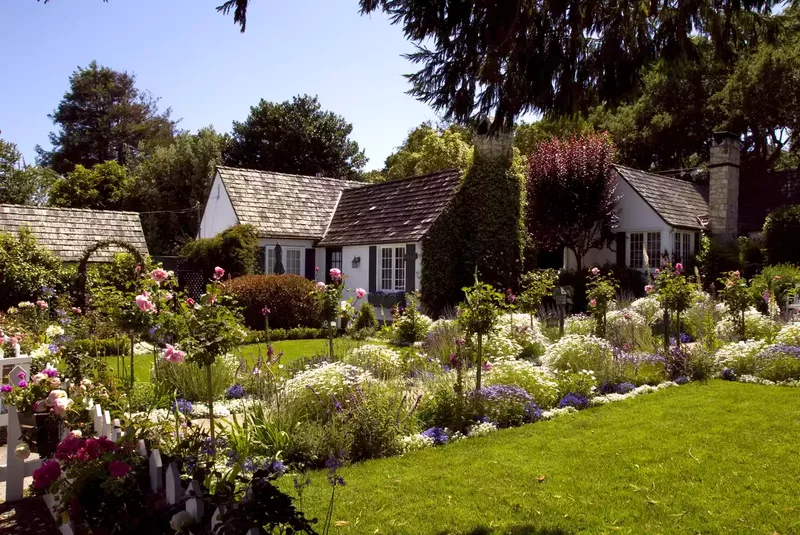 82 Stunning Front Yard Landscaping Ideas to Try This Spring 17 Flower-Filled Cottage Style Yard