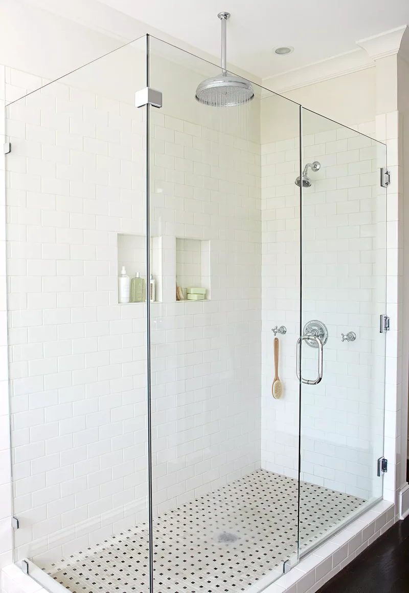 22 Stunning Bathroom Shower Designs for Your Dream Space 1 Frameless Shower Enclosure
