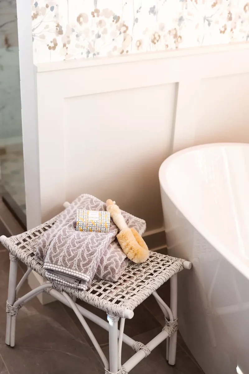 30 Beach-Inspired Bathroom Designs to Bring Coastal Vibes Home 24 Grab a Wicker Stool