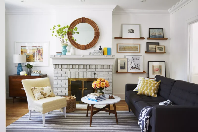 37 Modern Living Room Designs That Break All the Rules 20 Hang Decor in a Less Linear Layout