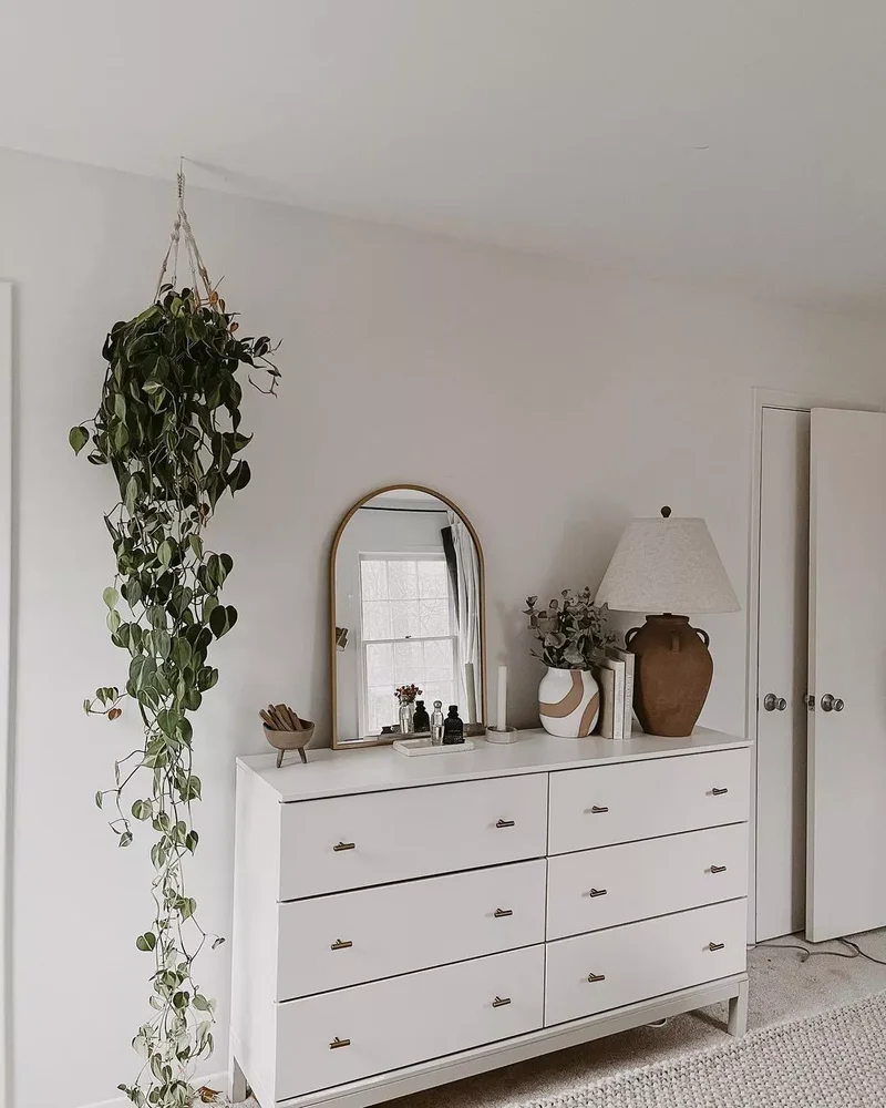 36 Beautiful Dresser Styling Ideas You Need to See Today 9 Hang a Ceiling Mounted Plant