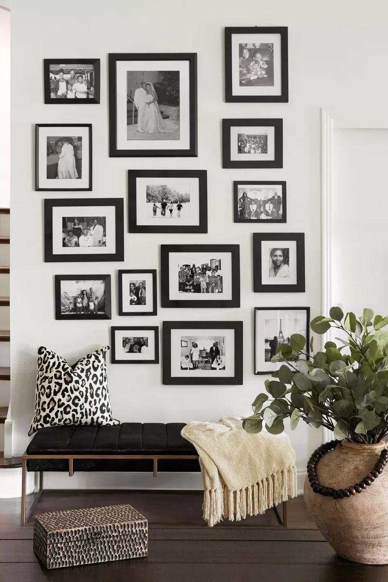 30 Black-and-White Living Room Ideas That Look Stunning 25 Hang a Gallery Wall