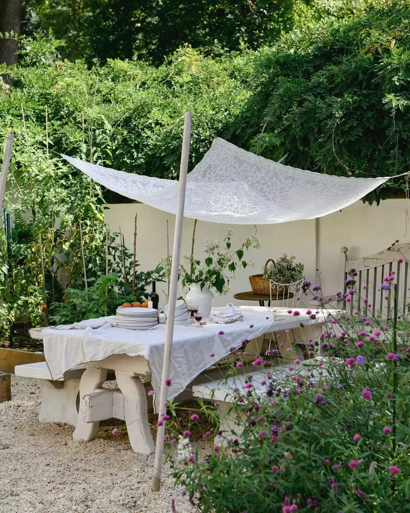 65 Outdoor Patio Decor Ideas to Elevate Your Backyard 30 Hang a Lacy Shade Sail