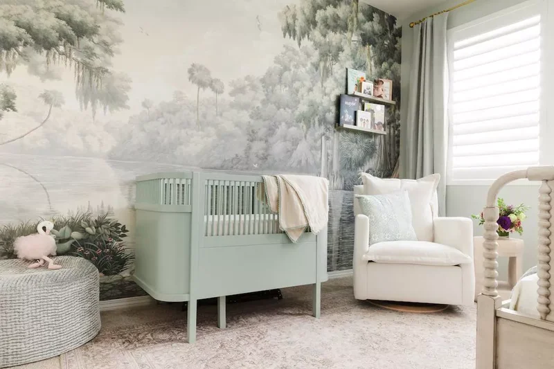 27 Sage Green Nursery Designs for Peaceful Baby Spaces 18 Hang a Landscape Mural